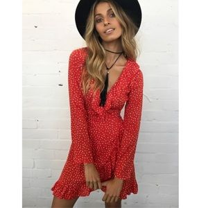 Red V neck polka dot ruffle dress